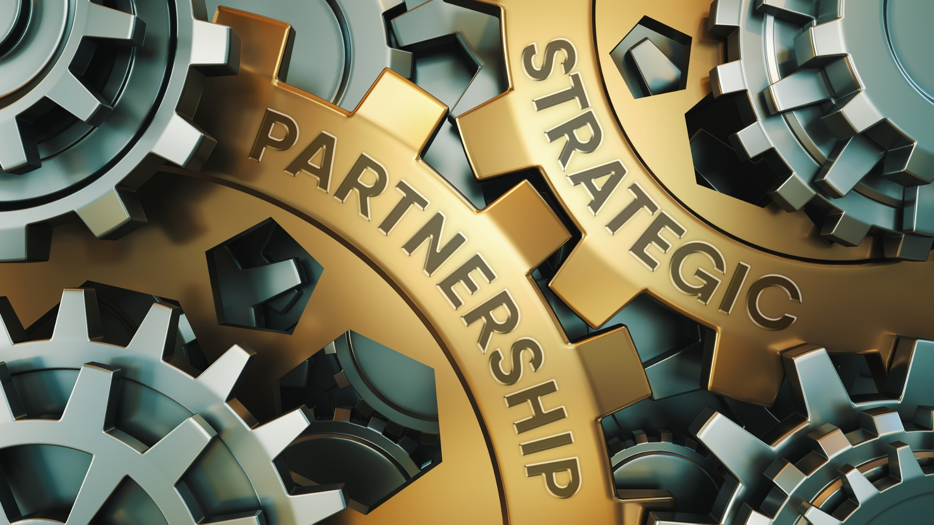 Sammensatte tandhjul med teksten Strategic Partnership